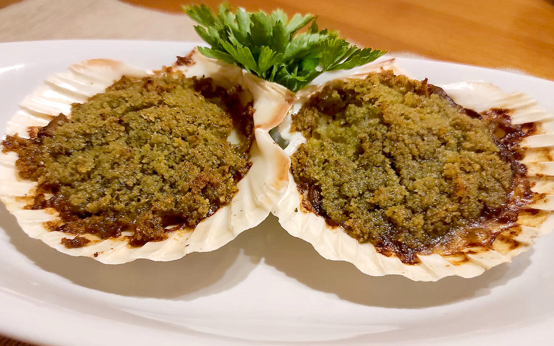 Capesante gratinate con funghi champignon